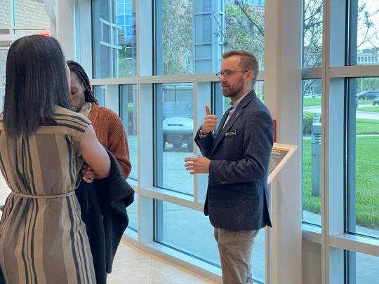 Tayler Campbell, assistant director of the academic program interdisciplinary studies (left) speaks with Ashley Morris, fourth-year public affairs social work doctoral student,(right) during the 3MT break at the Morgridge International Reading Center on Nov 15.
Ruby Marisol Merced