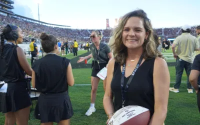 UCF football players honor their Spanish professor with award.